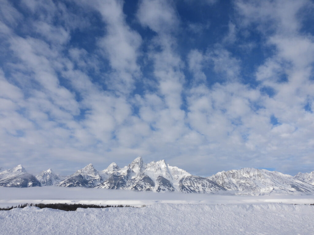 snowy mountain landscape across frozen Yellowstone valley
