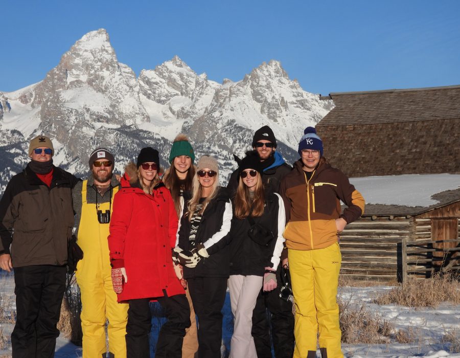 travelers posing together near Grand Teton mountain